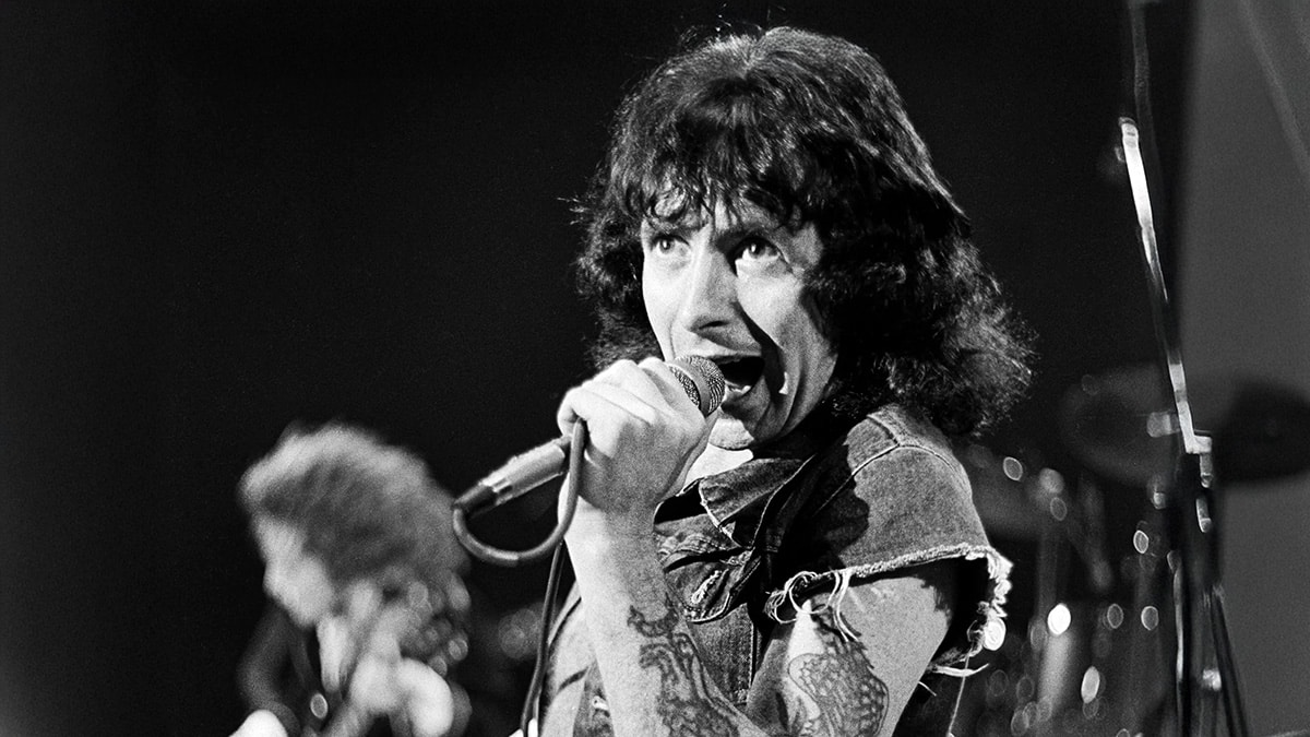 Bon Scott performing
